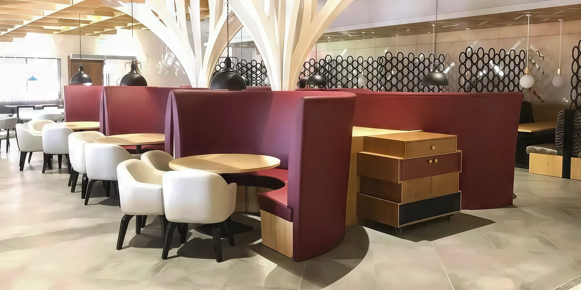 The Hide Restaurant, Abu Dhabi, dining chairs and booth seating with high back.
